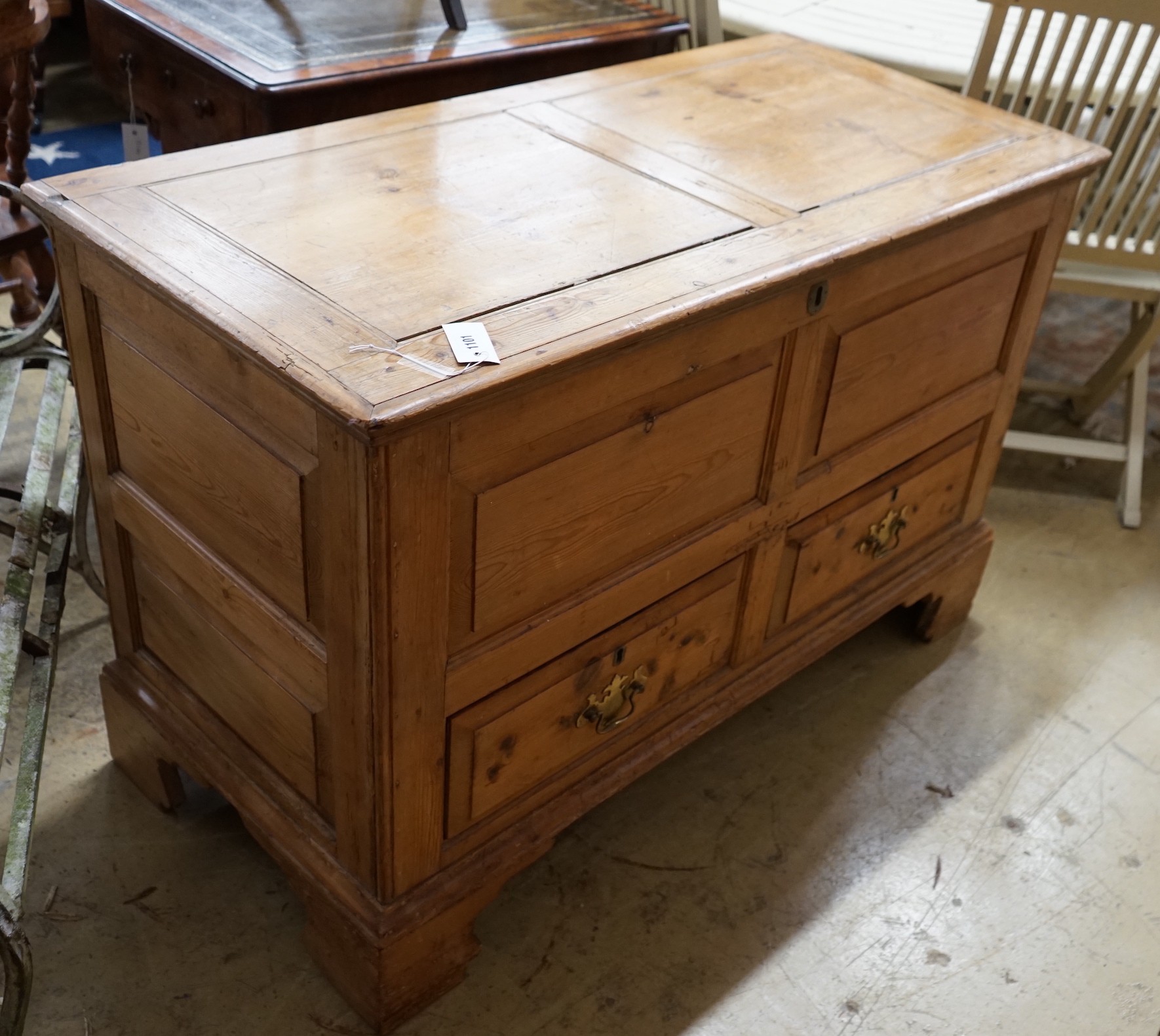 An 18th century panelled pine mule chest, width 118cm, depth 56cm, height 78cm